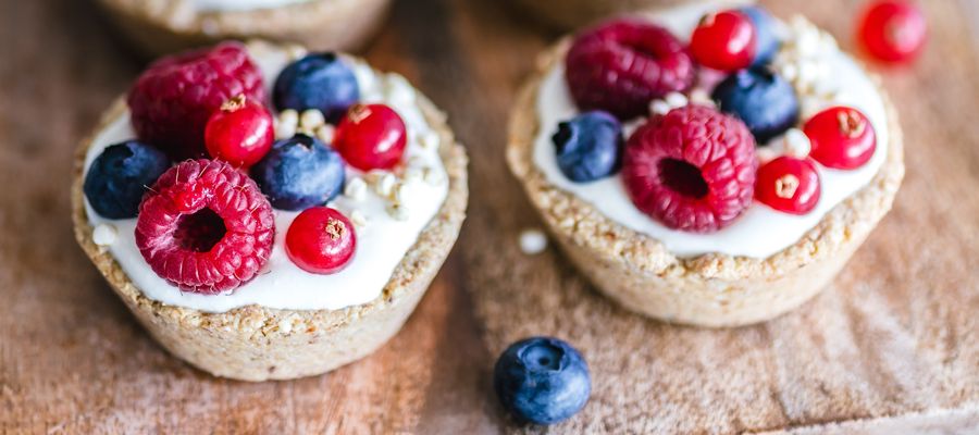 berry tarts on wooden background