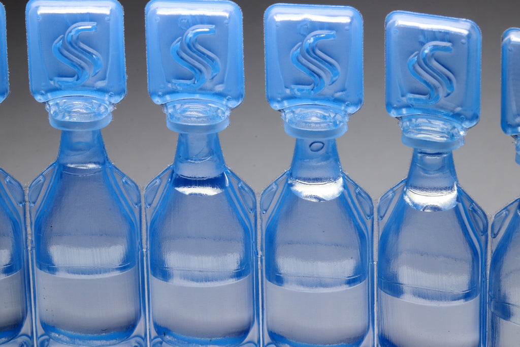 artificial tear bottles lined together